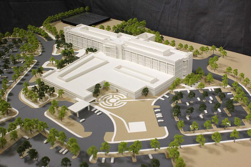 Proposed Hospital with parking and landscape Model of a proposed hospital showing parking and landscape