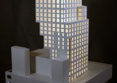 A white architectural model with interior lighting of the ODA designed Westly building in NYC